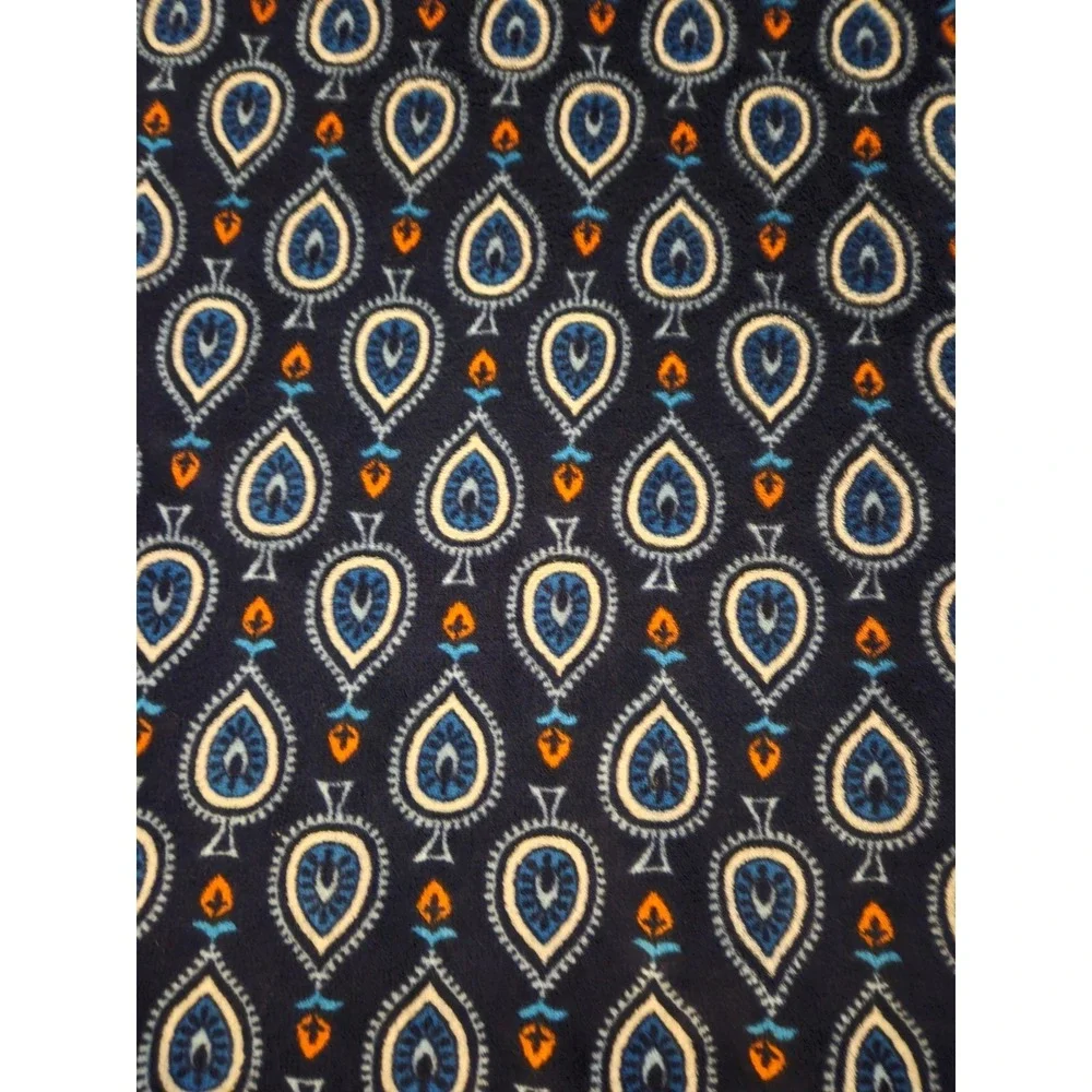 Vera Bradley Plush Throw Blanket features a Distinct Marrakesh Motifs Pattern.